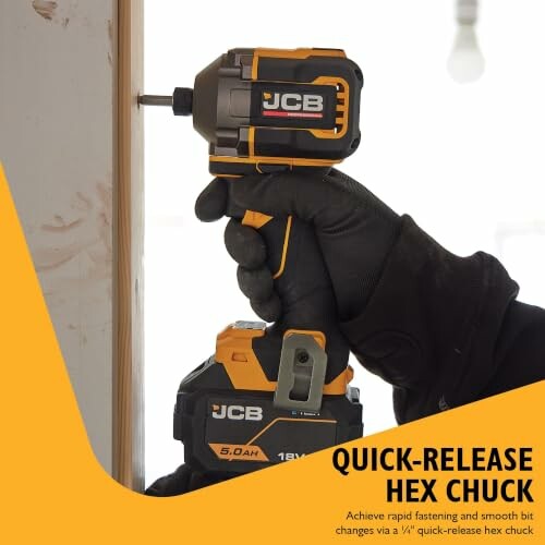 Person using a JCB power drill with quick-release hex chuck.